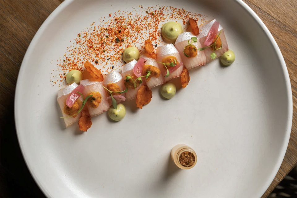 Sliced fish carpaccio dish served at Osaka restaurant in Miami